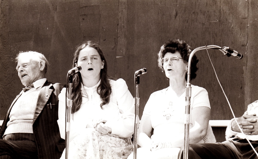 John Joe English, Anita Best, and Elsie Best on stage at the Newfoundland Folk Festival / Aidan O'Hara