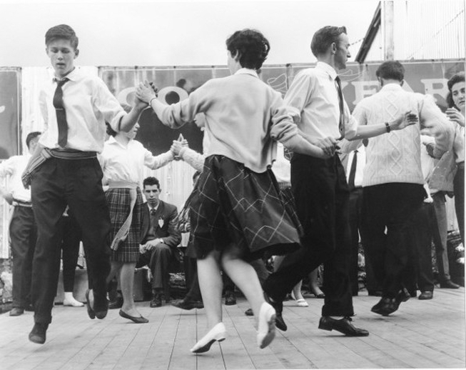 Group of men and women dancing on stage at the Fleadh Cheoil, Gorey, 1962 / Bord Fáilte